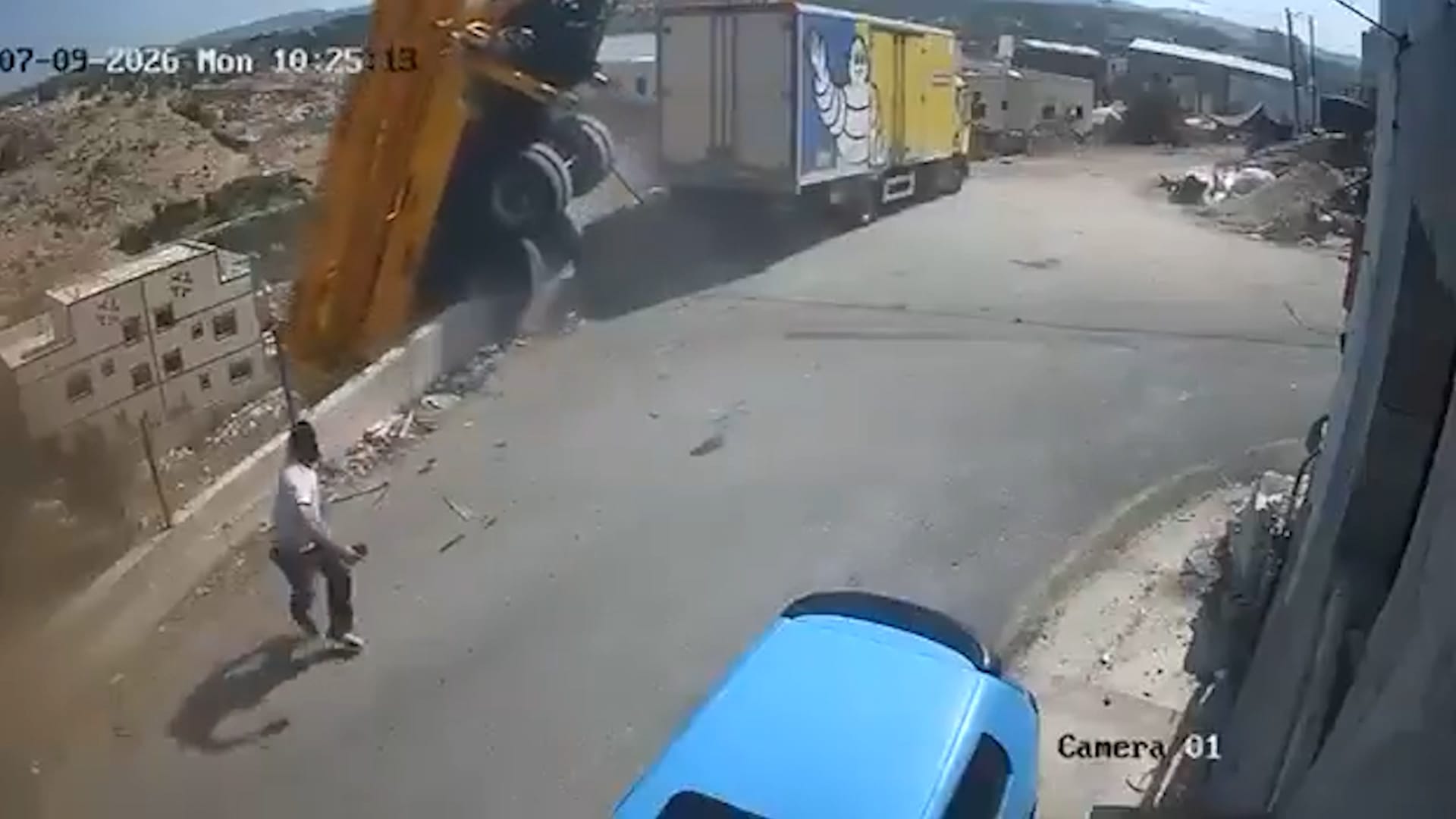 Truck driver jumps from cab before runaway vehicle plunges into ravine