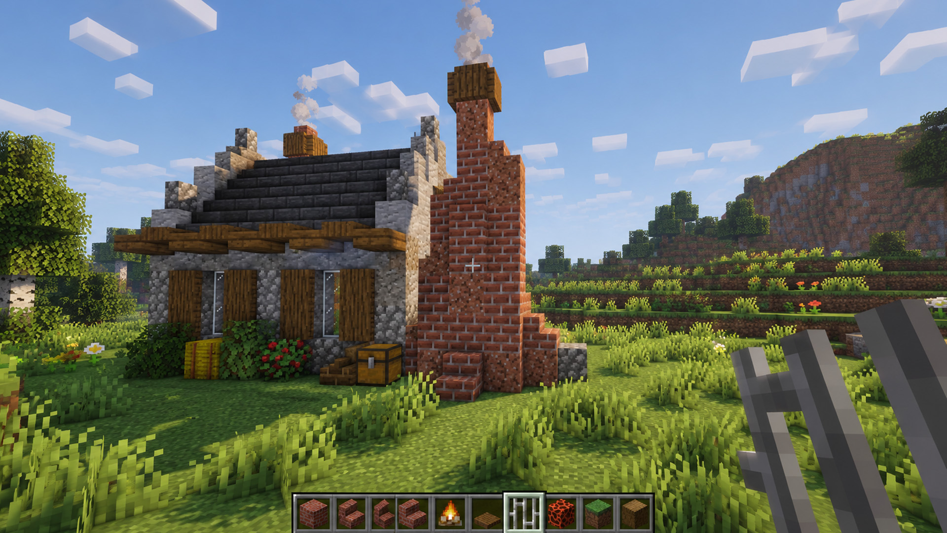 Simple Minecraft blacksmith build with a giant furnace chimney