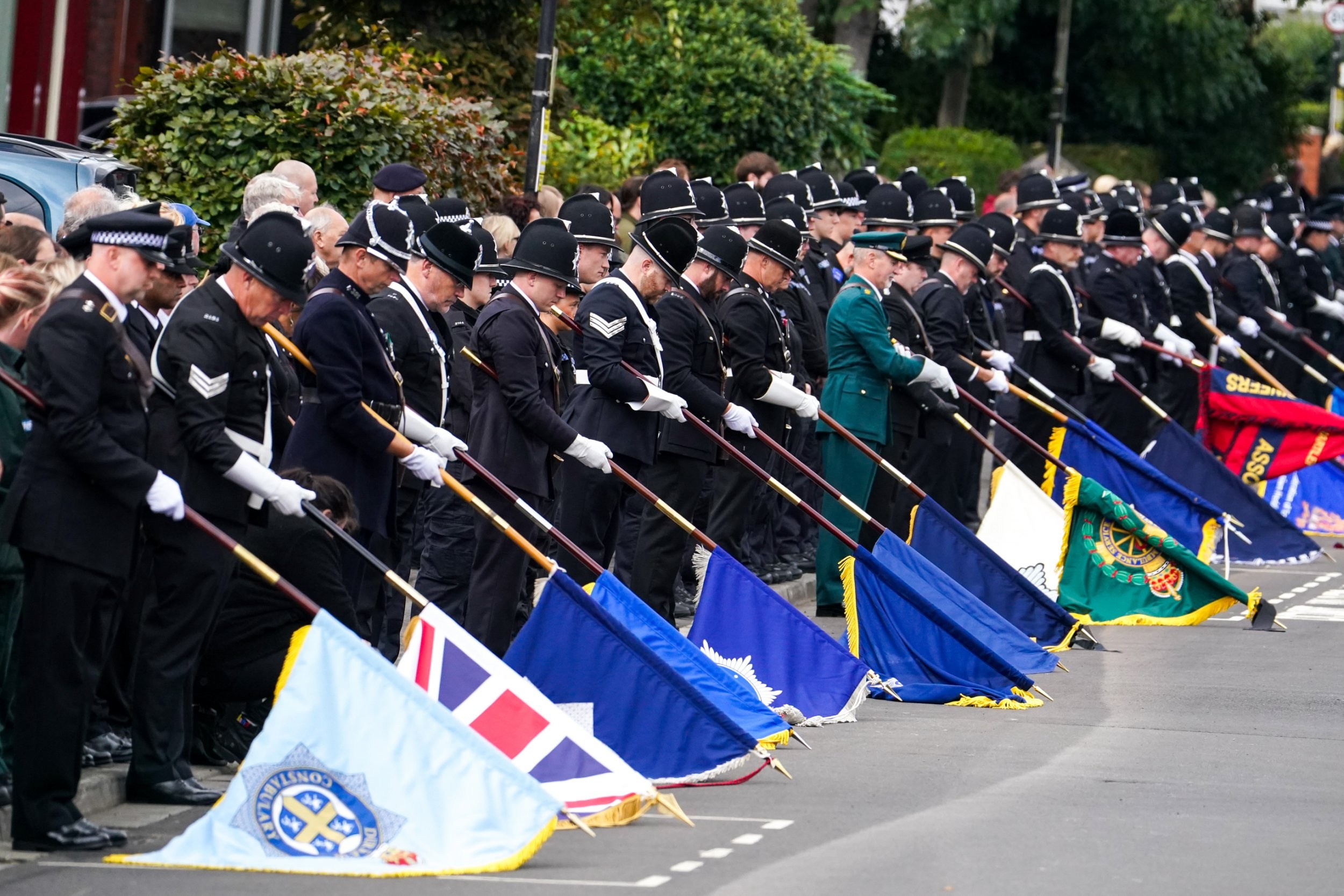 Touching message on police badges in tribute to officers killed in A66 ...