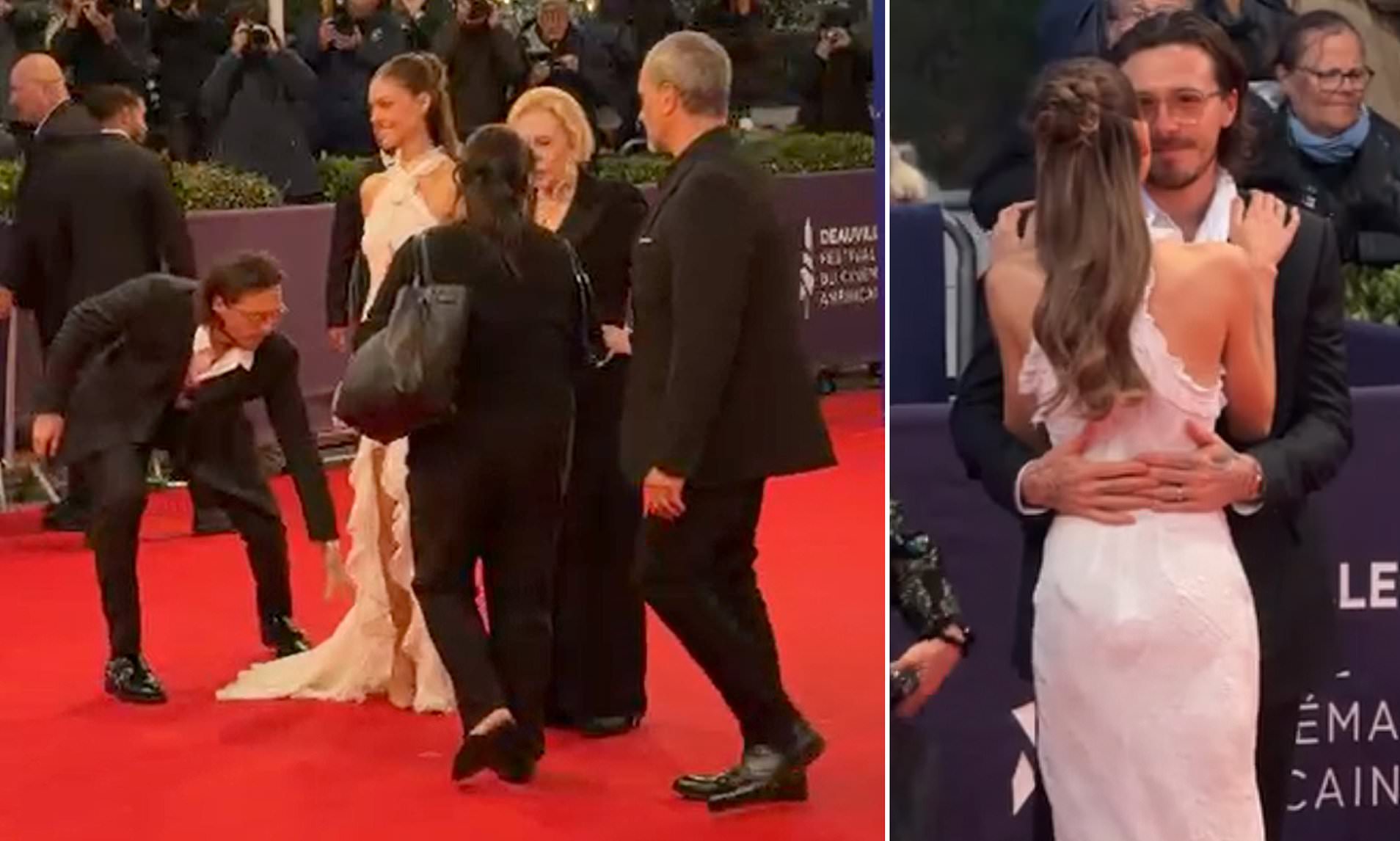 Brooklyn Beckham is Nicola Peltz's dutiful red carpet assistant once again as he rearranges her gown
