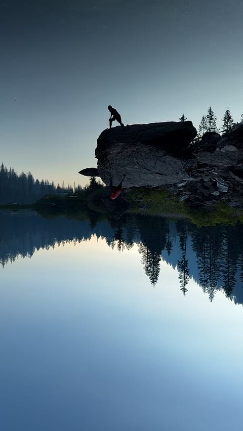 Lake reflection creates a striking optical illusion