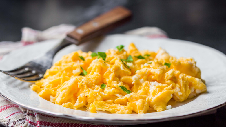 Make basic scrambled eggs luxurious by adding this premium French cheese