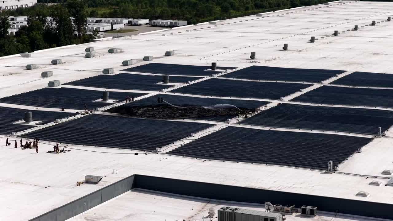 Solar panel catches fire on roof of industrial building near Okolona