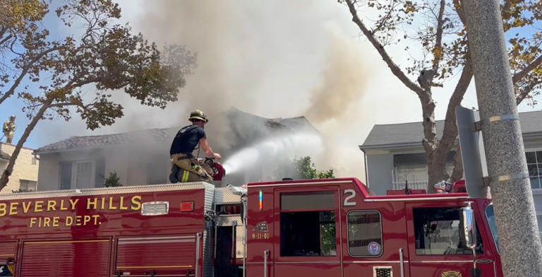 Massive fire engulfs Beverly Hills apartment complex as entire roof ...