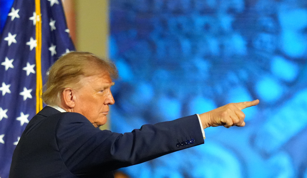 The latest: Trump centers himself in pitch to midterm voters, promising ...