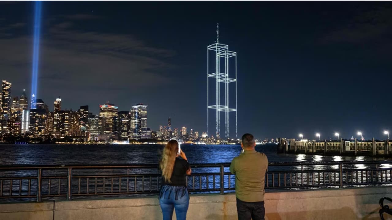 New York Harbor lights up as drones recreate Twin Towers in emotional 9 ...