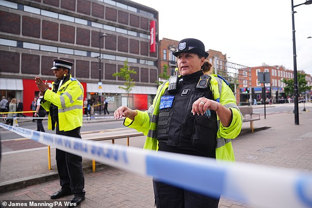 Four stabbed in KFC 'machete gang fight' in Bromley: Man fights for ...