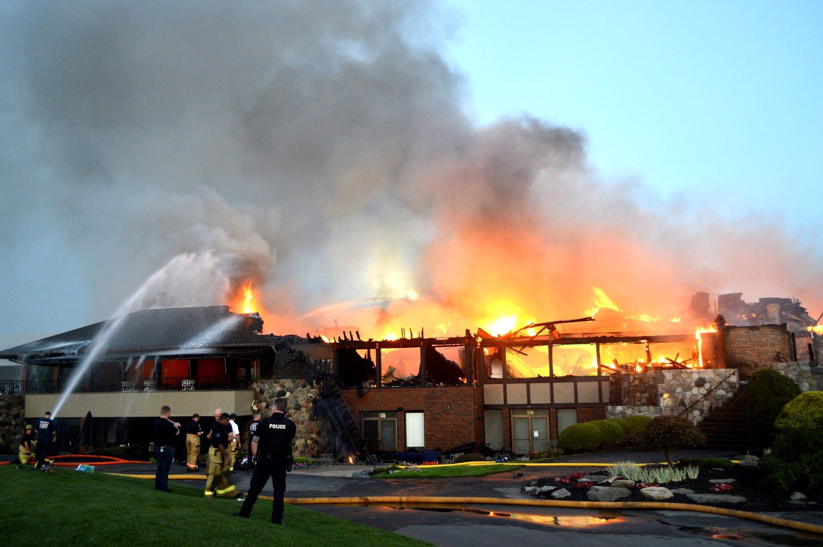 Firefighters dousing historic Lochmoor Club in Grosse Pointe Woods