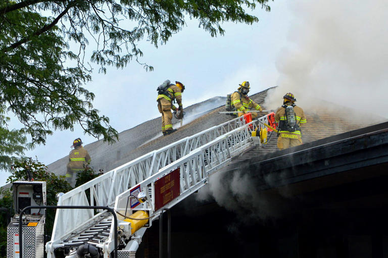 Firefighters dousing historic Lochmoor Club in Grosse Pointe Woods