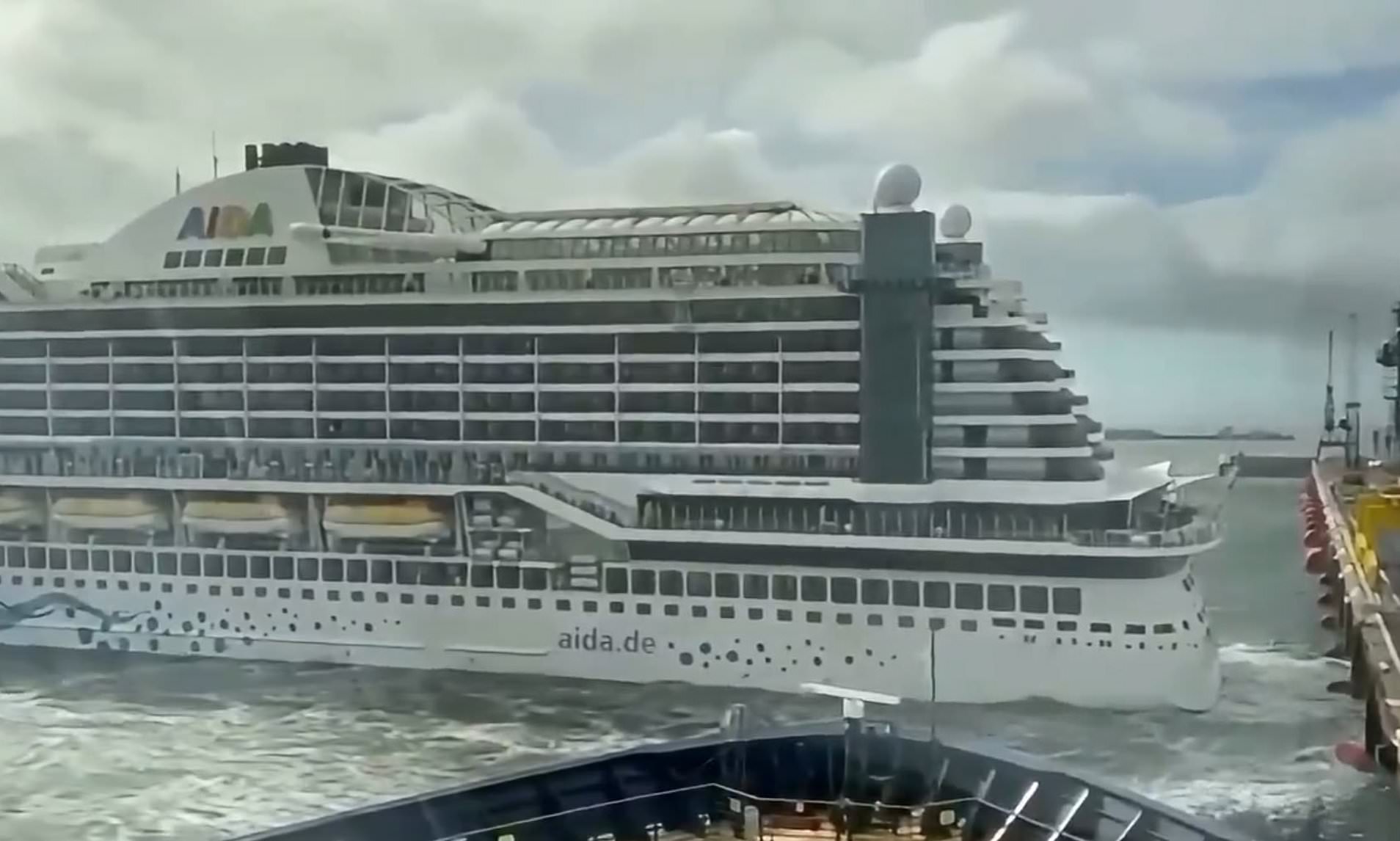 Moment 1,000ft UK-bound cruise ship slams into seawall after wind blew it from mooring