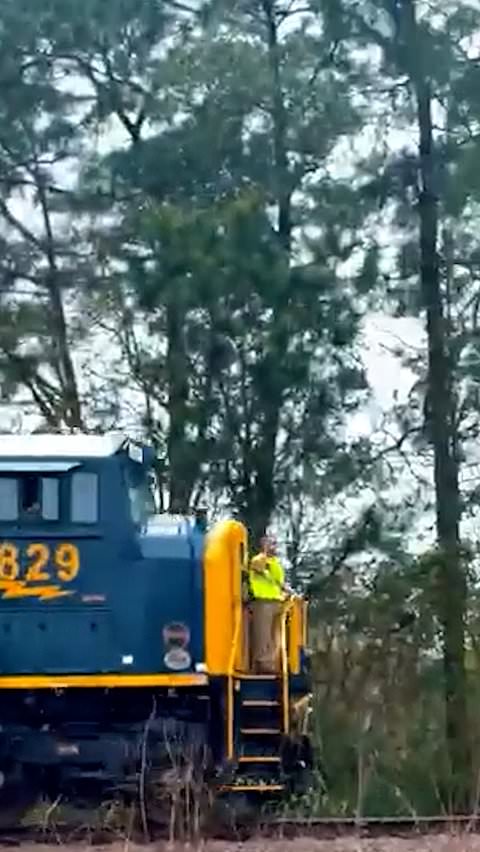 Train conductor dad blows kisses to his excited kids