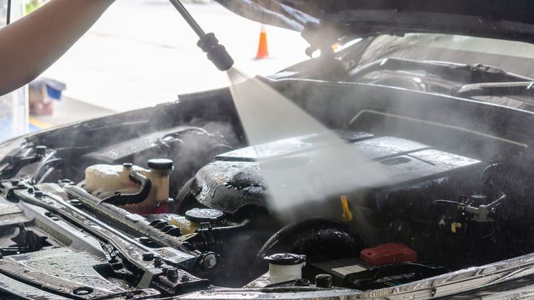 Is it safe to hose down your car's engine bay?