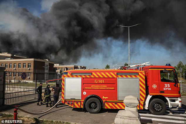 Fire crews closed a highway and battled blazes across Kyiv after the latest attacks from Moscow