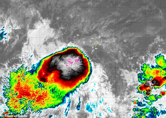Tropical storm Lowell projected to strike US as hurricane-ravaged state braces for impact