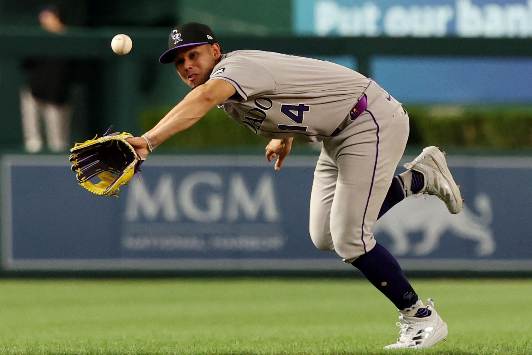 Purple Row after dark: What if MLB adopted a designated fielder?
