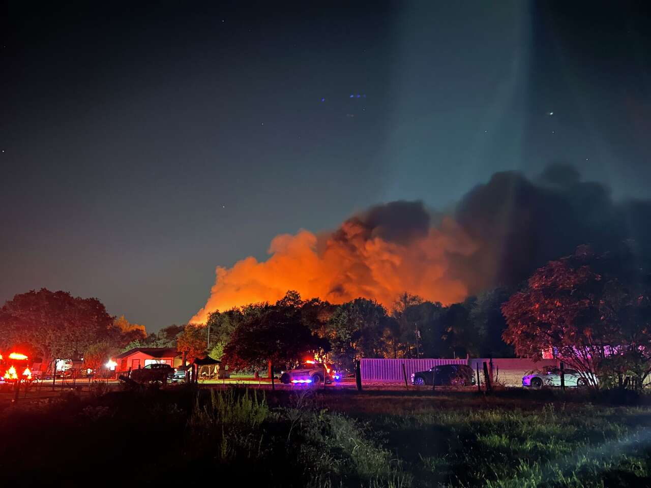 After massive Sandbranch fire, suppression efforts continued Sunday in area with no water infrastructure