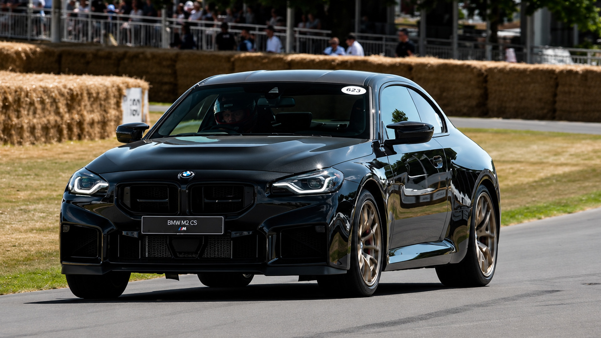 Rapid acceleration takes center stage as the BMW M2 CS hits the track