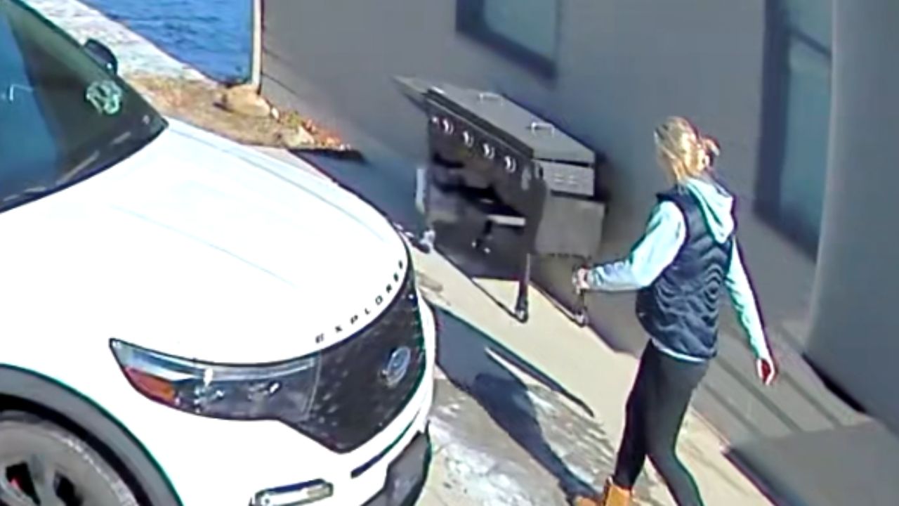 Woman's slip on icy surface captured in comedic fall