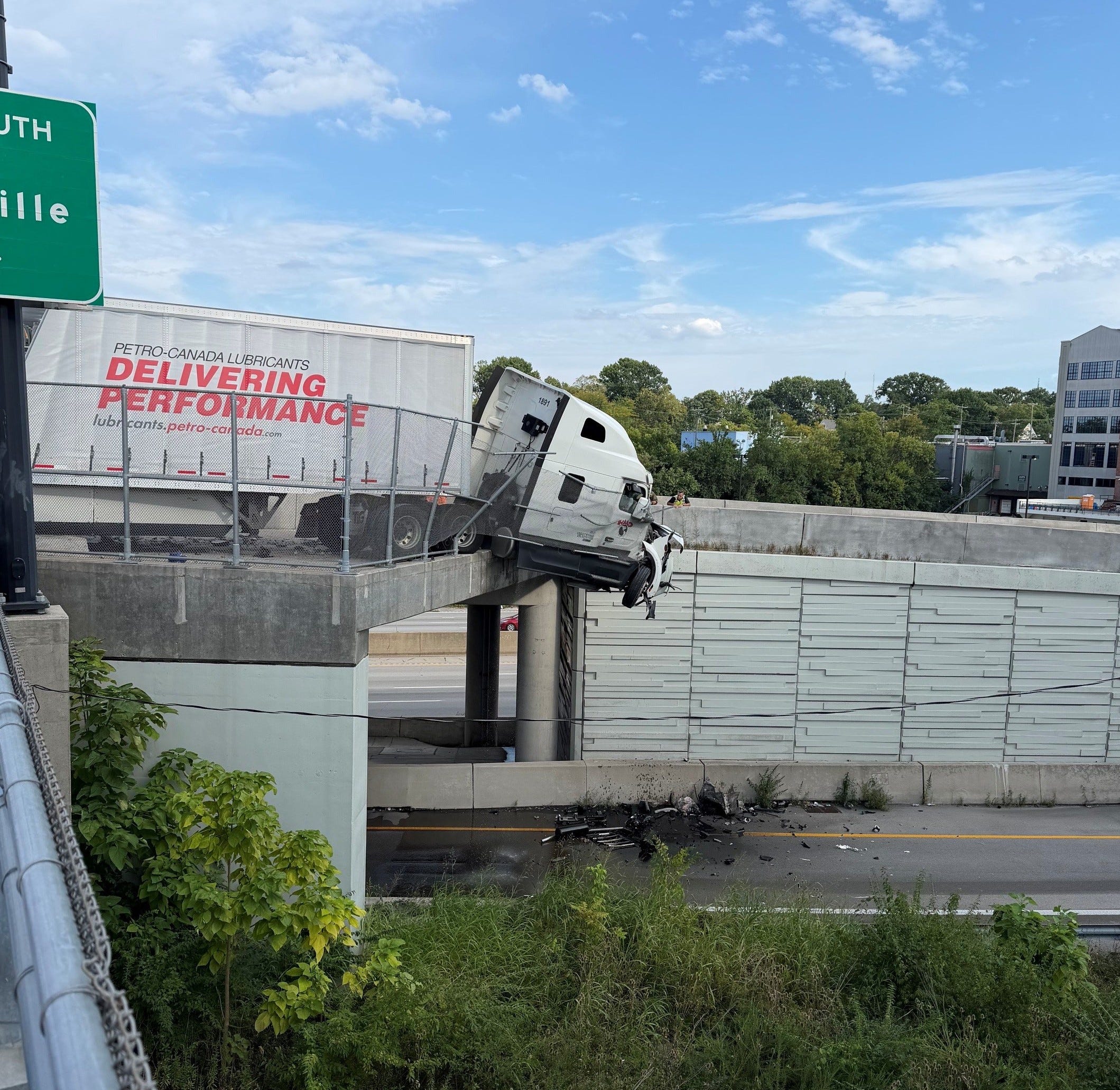 2 rescued from semi hanging off Interstate 71 overpass in Cincinnati