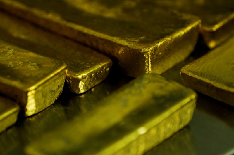 Gold feeble as Fed rate-hike bets rise; eyes best month since January