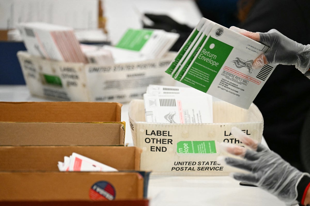 Judge blocks Trump’s new USPS rules for mail-in ballots
