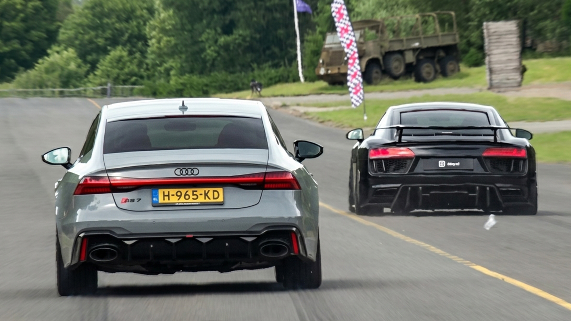 Audi RS7 chases down an Audi R8 in a drag race