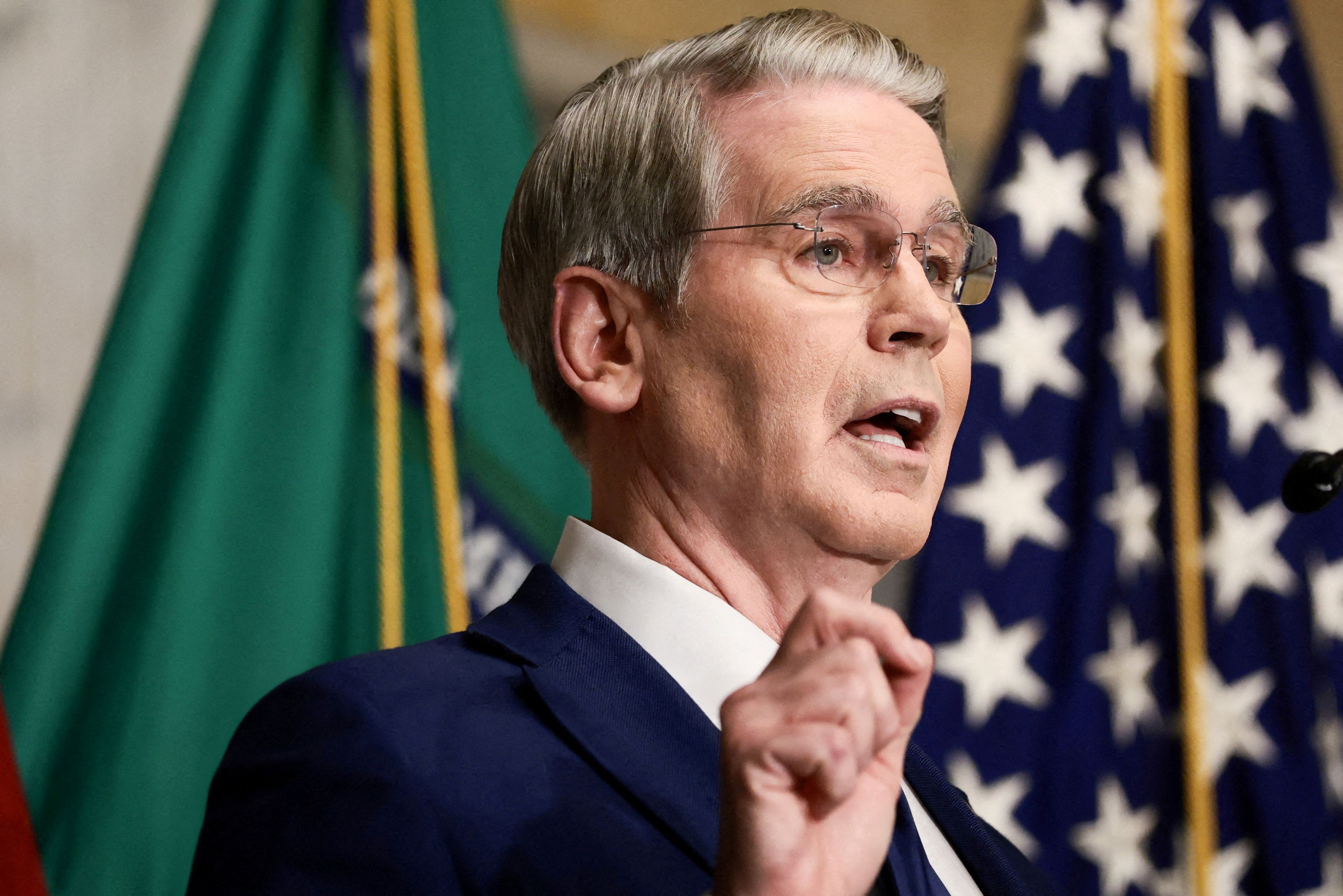 Iran's economy, long accustomed to sanctions, feels new US pressure