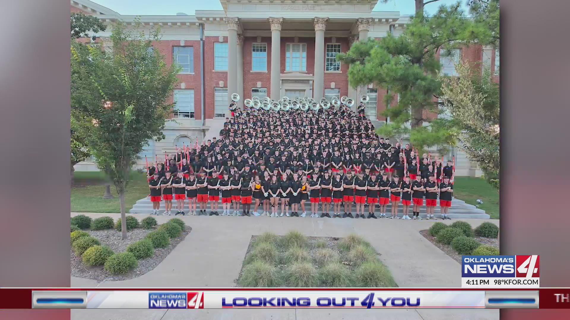 OSU band tries on new uniforms