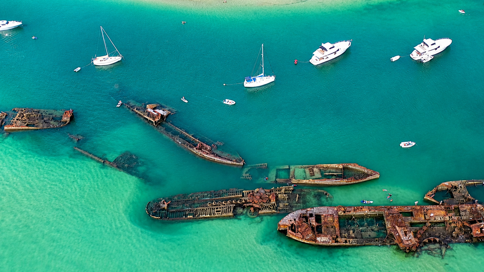 Rusting ships became part of this shallow coast