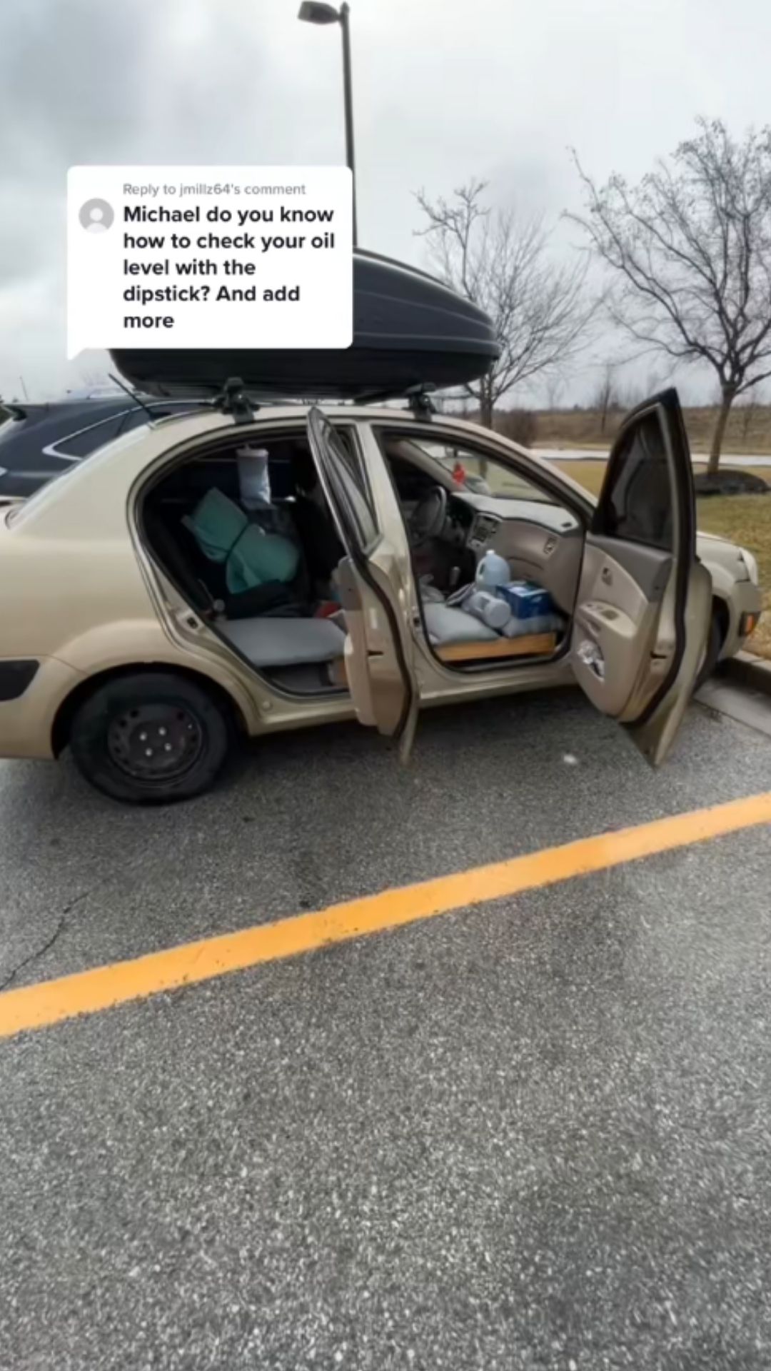 Checking engine oil level with a dipstick