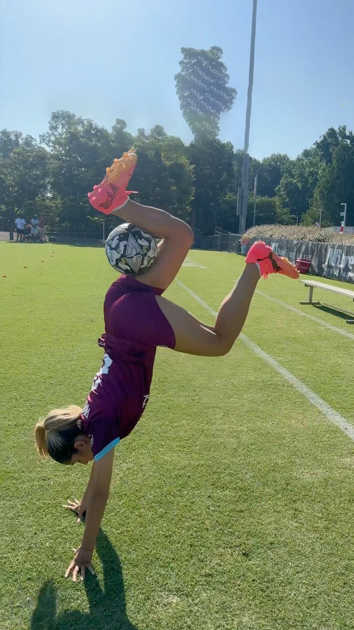 A girl showcasing elite ball control and agility