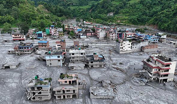 Nepal Flash Flood Leaves Hundreds Missing in Himalayan Border District