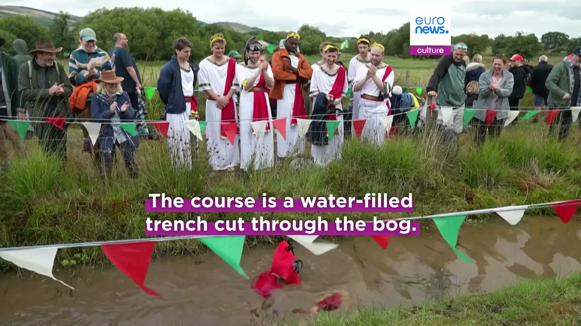 Mud, flippers and snorkels: Wales celebrates 40 years of bog racing