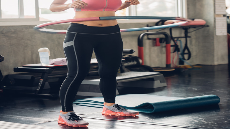 What a personal trainer says about TikTok's core strengthening weighted hula hoop workout