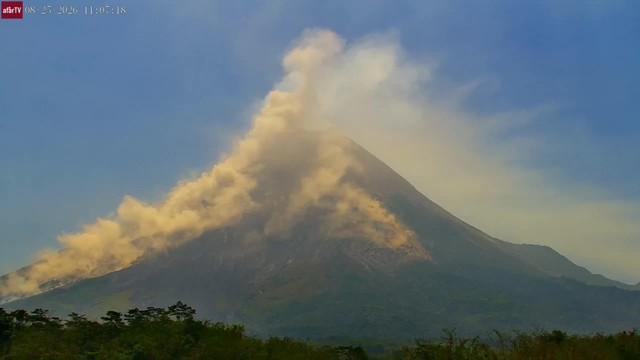 Watch massive rockfalls send clouds of ash down Merapi volcano