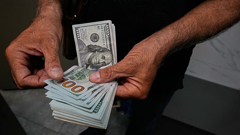 Iranian rial in freefall as dollar breaks 2.1 million mark