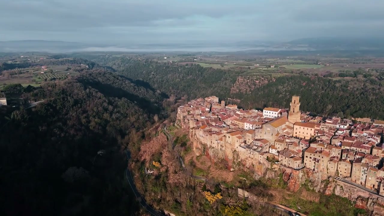 Pitigliano, Italy: Drone soars over cliffside town