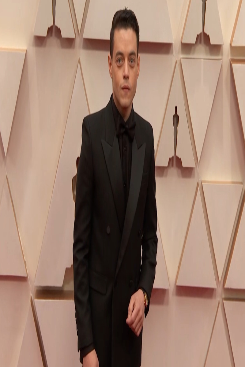 Rami Malek commands the Oscars in sleek all-black tuxedo
