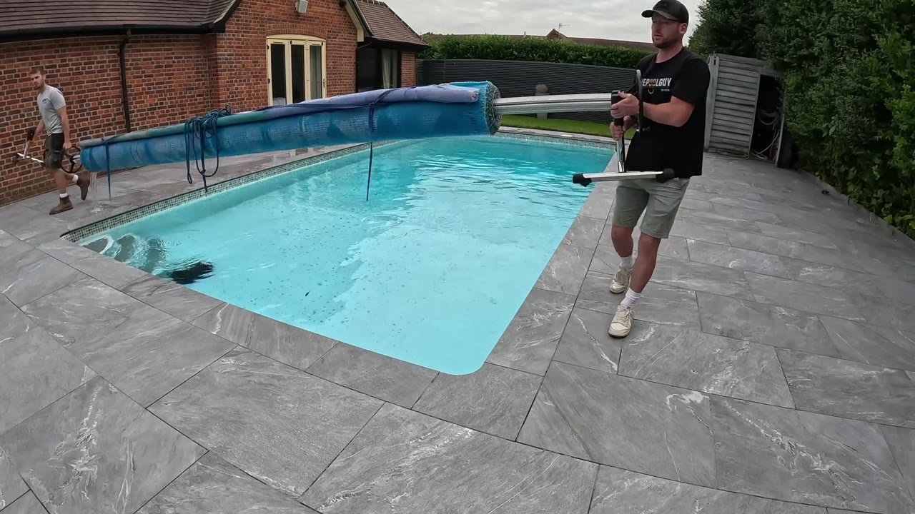 This automatic cover keeps the pool hidden, protected and almost ...