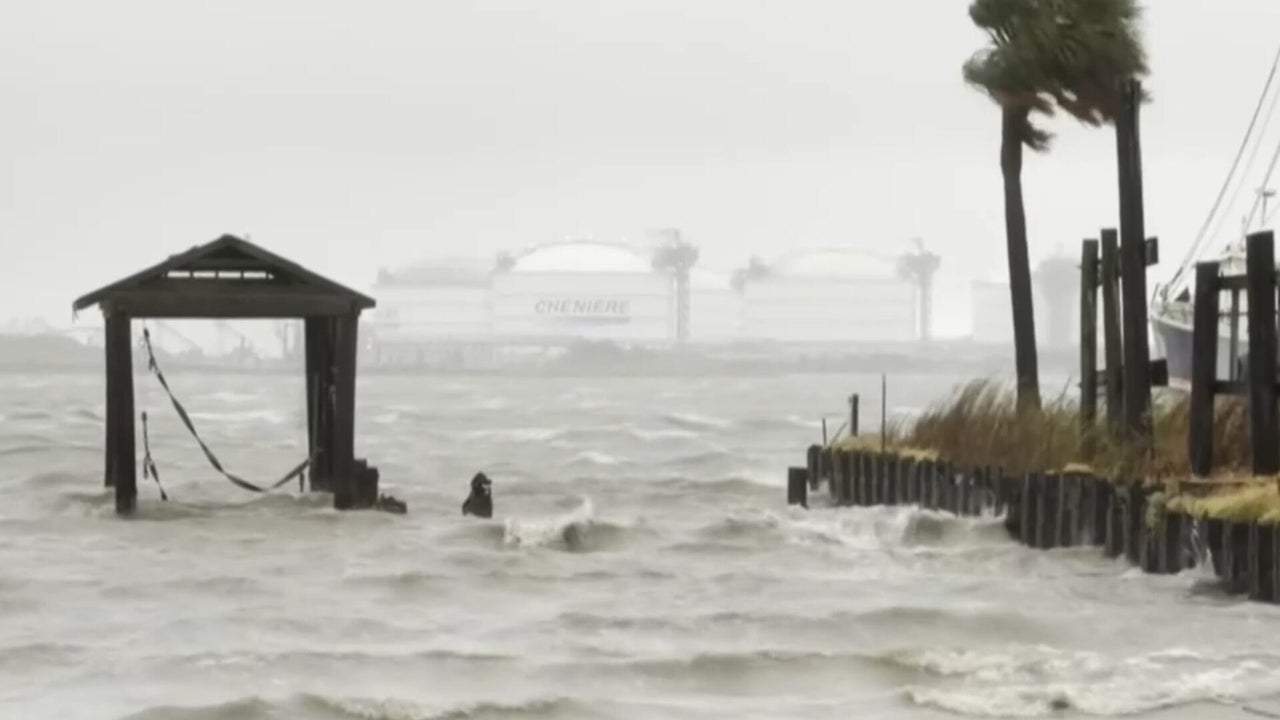 Edouard dumps rain on the Gulf Coast forcing power outages and flooding