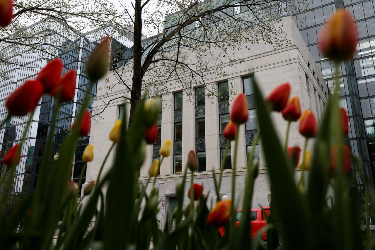 Bank of Canada keeps rate steady, warns trade conflict could upend recovery