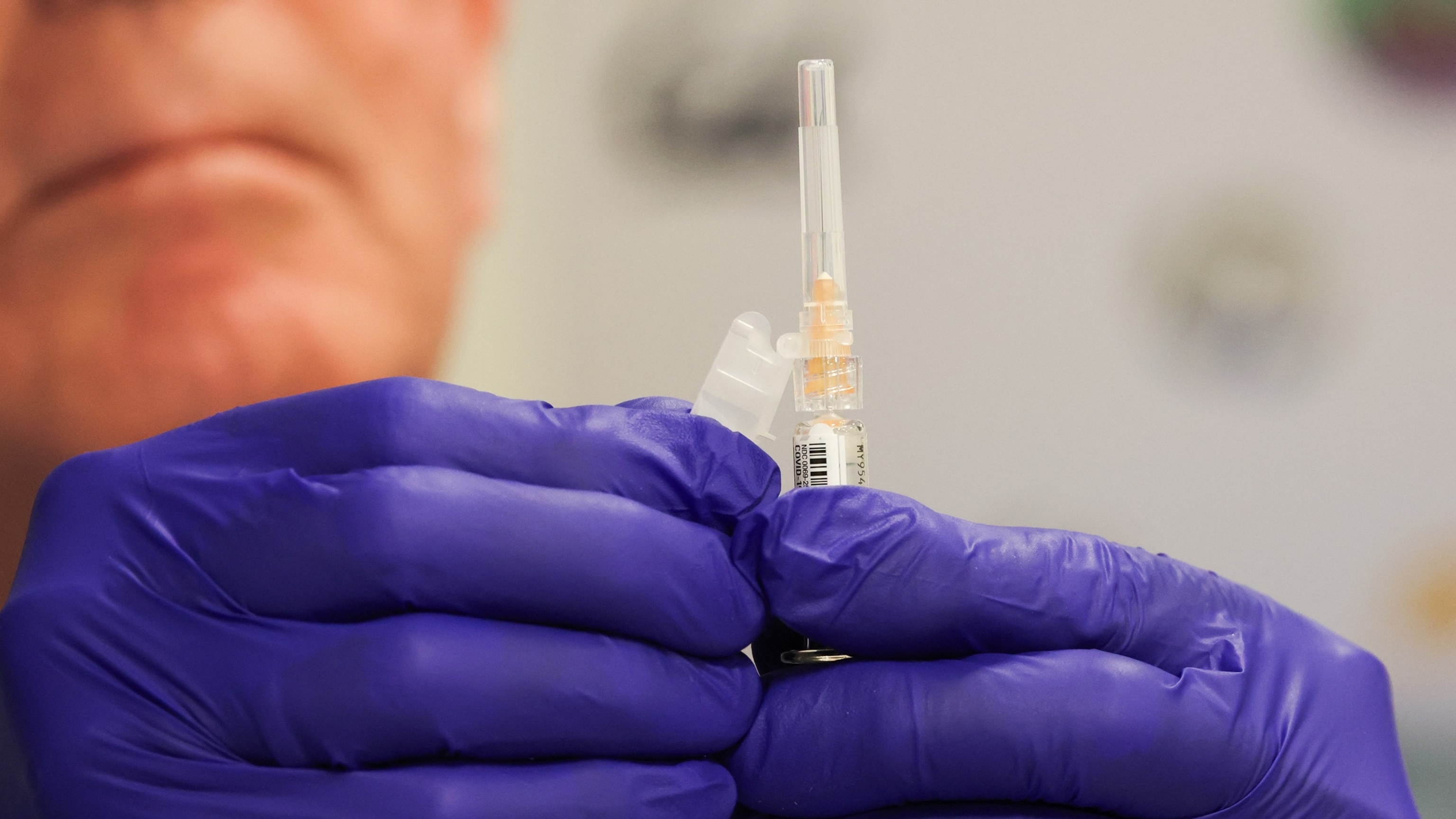 Updated COVID-19 vaccines are coming this fall. Will insurance cover them?