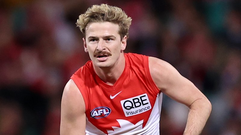 Swans player remains stood down despite being cleared by police