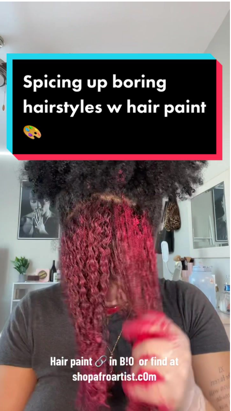 Adding a bold touch with red afro hair color