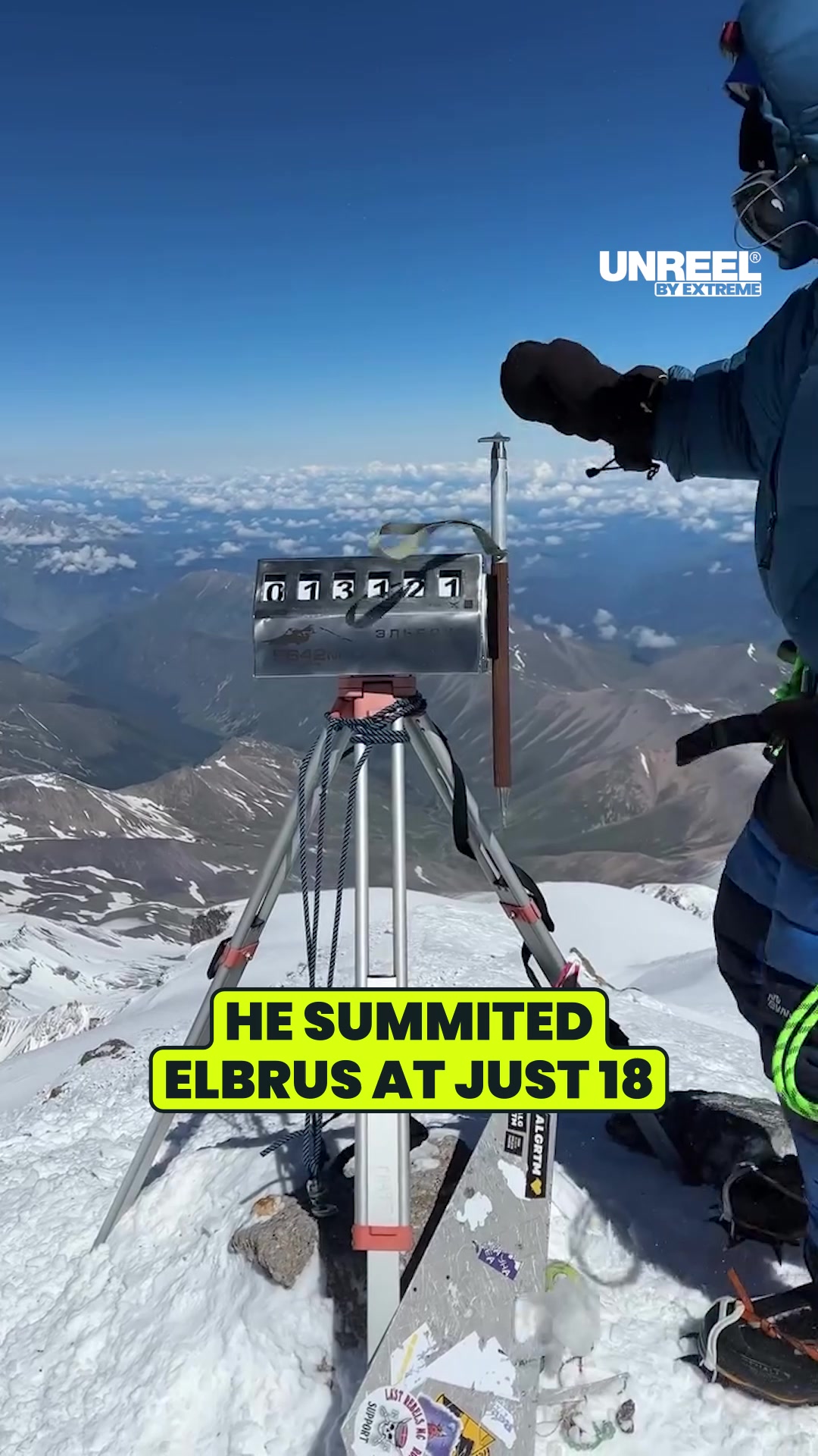 Young climber conquers Mount Elbrus: Summit celebration at Europe’s ...