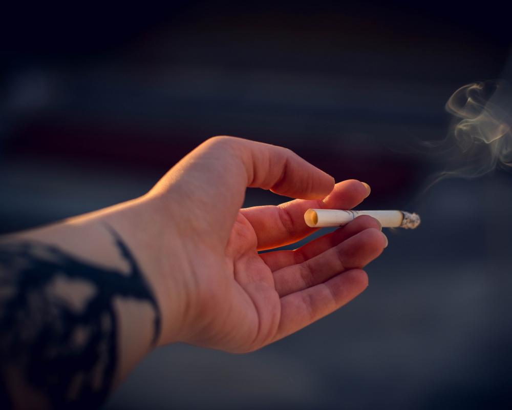 Coalition plan to cut tobacco excise by 80% 'will kill people,' Labor says amid public health alarm