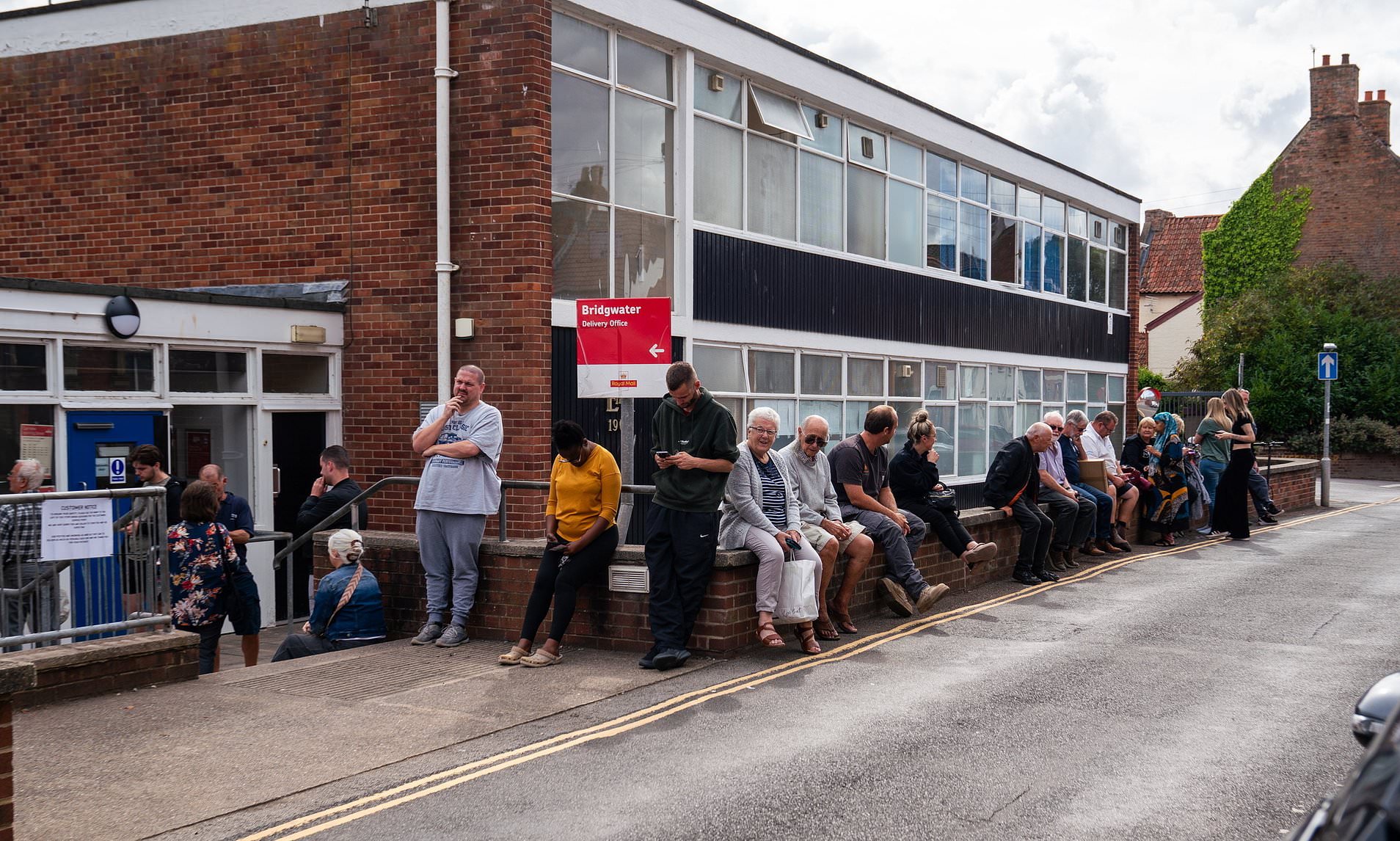 Royal Mail customers must queue for hours for essential post after six weeks without deliveries