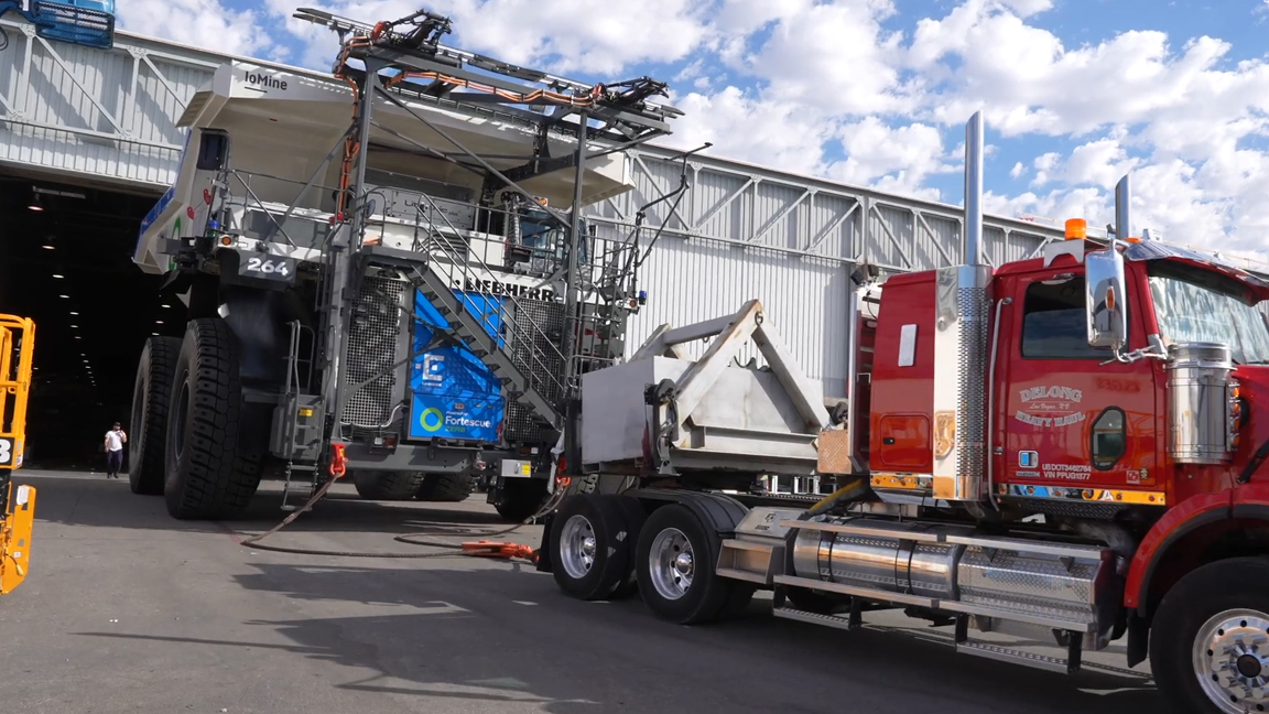 Huge mining truck up close during workshop operations