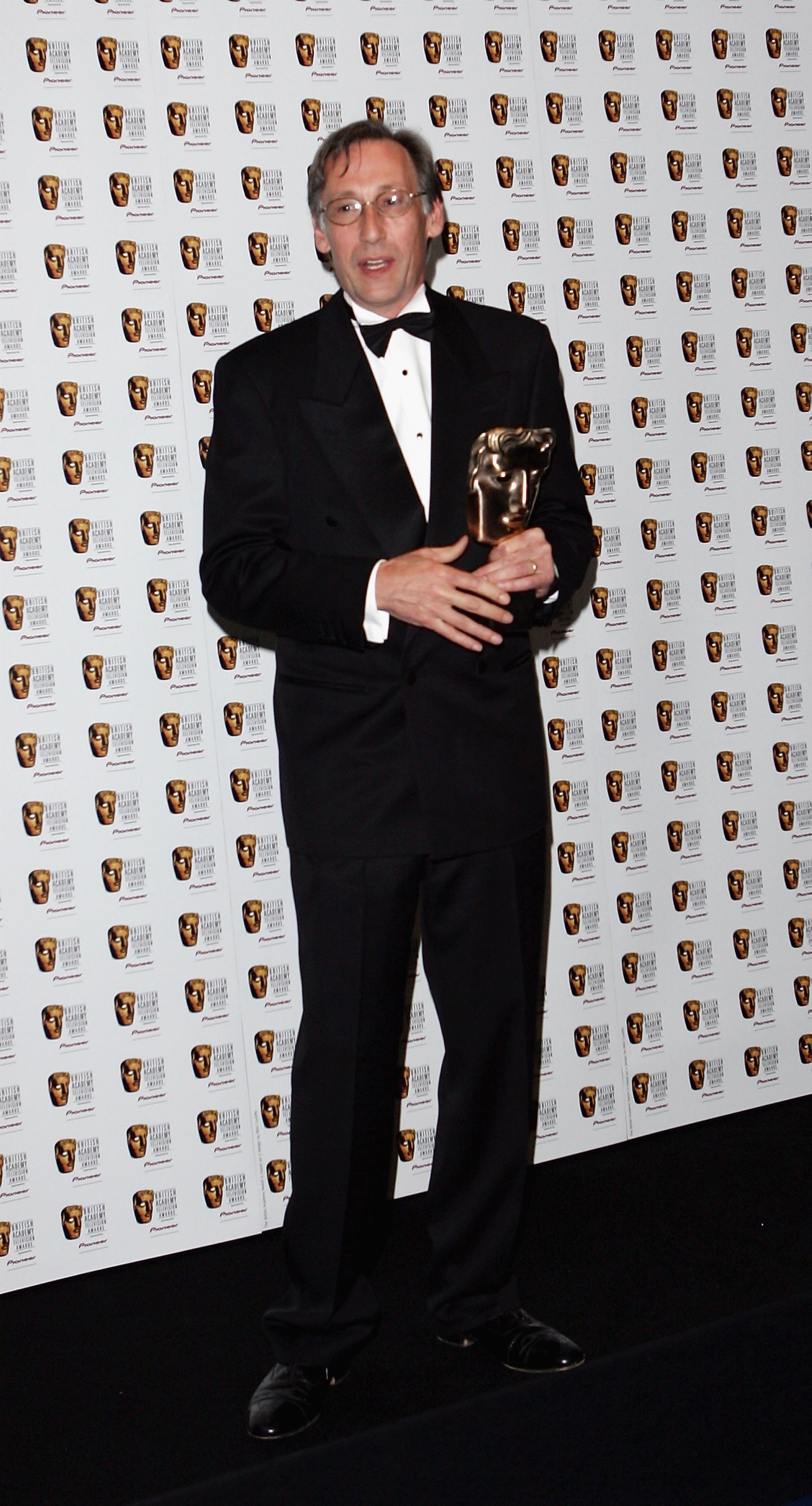 Chris Langham poses in the Awards Room with the Comedy Performance Award for his role in ‘The Thick Of It’ (Getty)