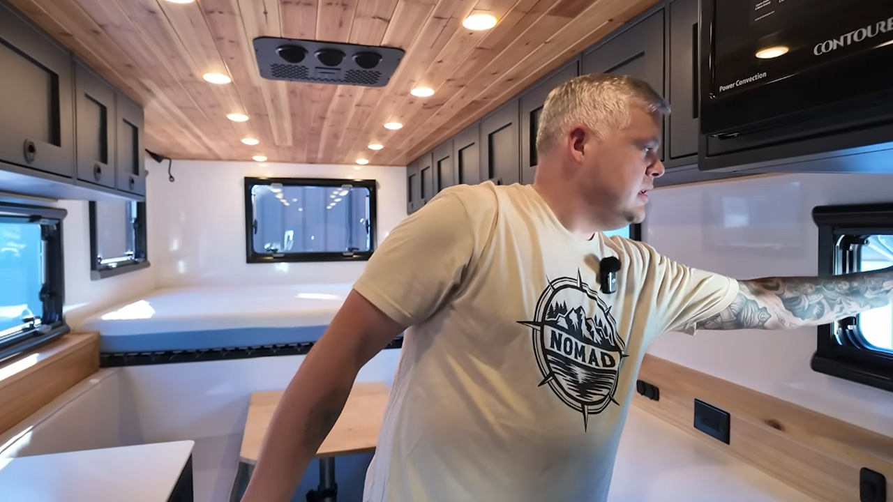 Inside a million dollar off grid adventure motorhome kitchen setup